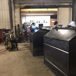 Steel dumpsters being fabricated